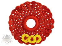 Háčkovaná oranžová kulatá dečka se třemi žlutými kytičkami 