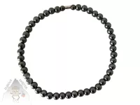 Korálkový náramek z hematitu s lesklými tmavými kuličkami, minimalistický přírodní šperk na elastické niti.